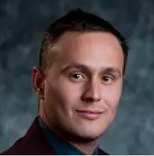Headshot of Justin Phillips.